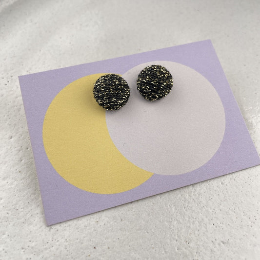 kleine Stoffstecker . Glitzer auf Schwarz