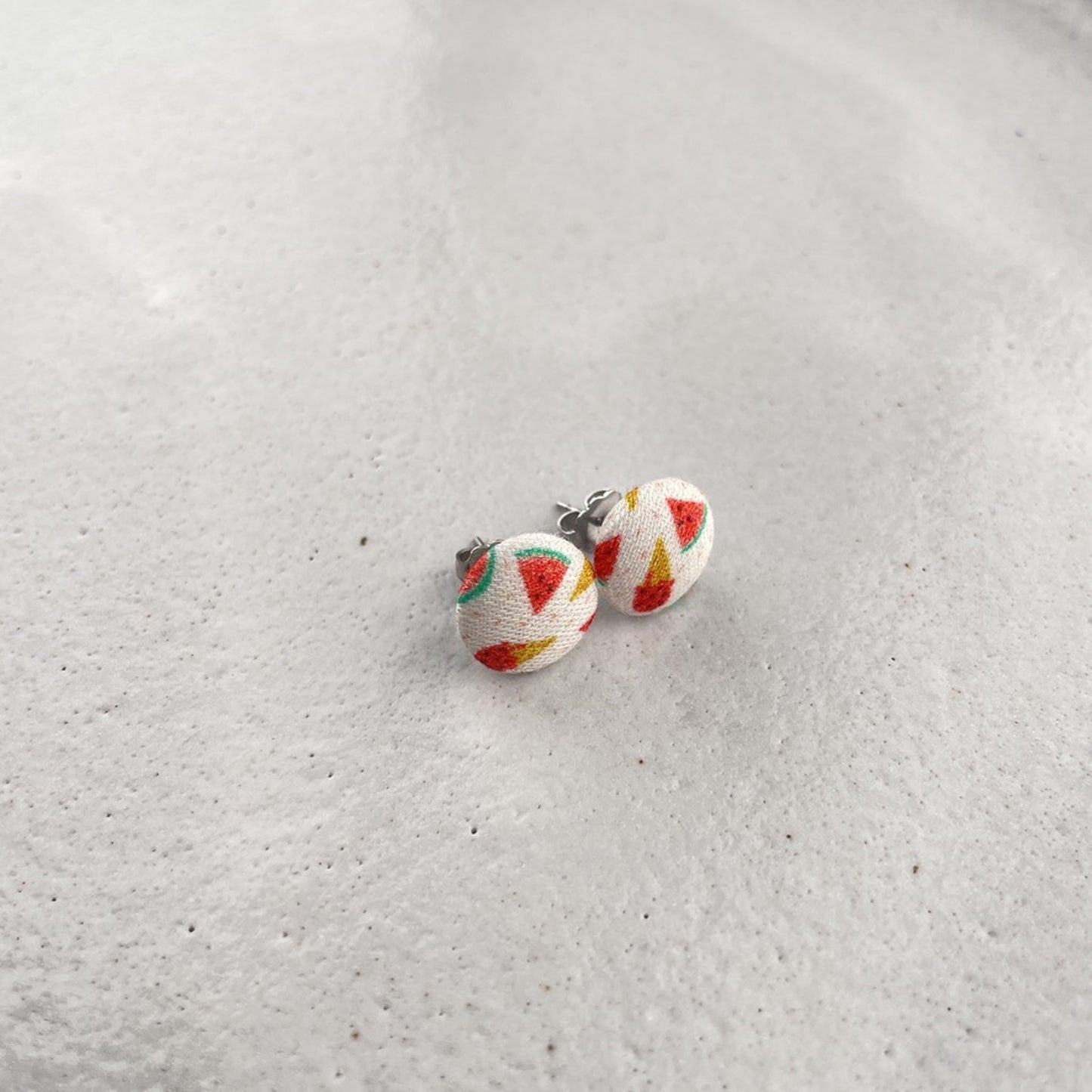kleine Stoffstecker . Meloneneis